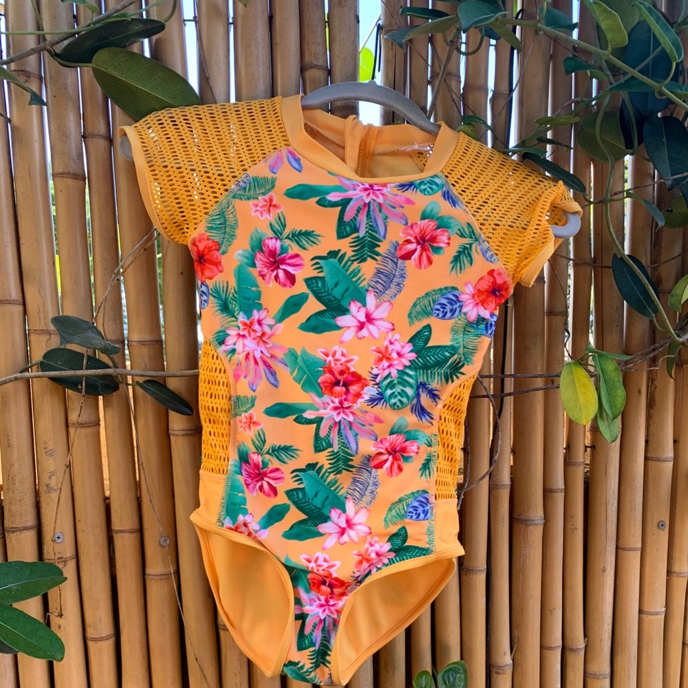 Floral swim suit with mesh sleeves